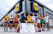 2 April 2024; In attendance at a photocall ahead of the 2024 Lidl Ladies National Football League Finals are Uachtarán Cumann Peil Gael na mBan, Mícheál Naughton and Eimear O’Sullivan, Corporate Affairs Director at Lidl Ireland and Northern Ireland with, children Tom, age 8, Katie, age 3 and Josh O'Siochain and players, from left, Roscommon captain Ellen Irwin, Clare captain Caoimhe Harvey, Armagh captain Clodagh McCambridge, Kerry captain Niamh Carmody, Tyrone captain Aoibhinn McHugh, Kildare captain Grace Clifford, Carlow captain Ruth Bermingham and Limerick captain Róisín Ambrose. The Divisions 3 and 4 Finals will be played at Grant Heating St Brendan’s Park, Birr, next Saturday, April 6, followed by the Divisions 1 and 2 Finals at Croke Park next Sunday, April 7. Photo by David Fitzgerald/Sportsfile