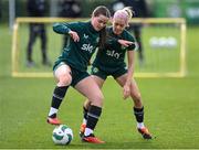 2 April 2024; Tyler Toland is tackled by Denise O'Sullivan during a Republic of Ireland Women's training session at the FAI National Training Centre in Abbotstown, Dublin. Photo by Stephen McCarthy/Sportsfile