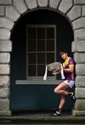 3 April 2024; Liam Coleman of Wexford poses for a portrait with the Delaney Cup at the launch of the 2024 Leinster GAA Senior Football Championship, in the National Museum of Ireland Dublin. Photo by Brendan Moran/Sportsfile