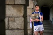 3 April 2024; Evan O'Carroll of Laois poses for a portrait with the Delaney Cup at the launch of the 2024 Leinster GAA Senior Football Championship, in the National Museum of Ireland Dublin. Photo by Brendan Moran/Sportsfile
