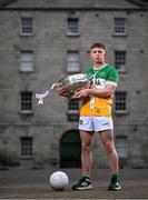 3 April 2024; Lee Pearson of Offaly poses for a portrait with the Delaney Cup at the launch of the 2024 Leinster GAA Senior Football Championship, in the National Museum of Ireland Dublin. Photo by Brendan Moran/Sportsfile