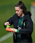 3 April 2024; Lucy Quinn cleans her boots after a Republic of Ireland Women's training session at the FAI National Training Centre in Abbotstown, Dublin. Photo by Stephen McCarthy/Sportsfile