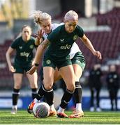 4 April 2024; Denise O'Sullivan is tackled by Lily Agg during a Republic of Ireland Women's training session at Stage Saint-Symphorien in Metz, France. Photo by Stephen McCarthy/Sportsfile