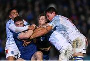 29 March 2024; Rob Russell of Leinster, supported by teammate Luke McGrath, is tackled by Devon Williams, Embrose Papier and Elrigh Louw of Vodacom Bulls during the United Rugby Championship match between Leinster and Vodacom Bulls at the RDS Arena in Dublin. Photo by Harry Murphy/Sportsfile