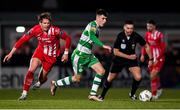 9 March 2024; Darragh Burns of Shamrock Rovers in action against Nando Pijnaker of Sligo Rovers during the SSE Airtricity Men's Premier Division match between Sligo Rovers and Shamrock Rovers at The Showgrounds in Sligo. Photo by Stephen McCarthy/Sportsfile