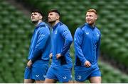 5 April 2024; Leinster players, from left, Harry Byrne, Ross Byrne and Ciarán Frawley during a Leinster rugby captain's run at the Aviva Stadium in Dublin. Photo by Harry Murphy/Sportsfile