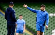 5 April 2024; Ross Byrne and head coach Leo Cullen during a Leinster rugby captain's run at the Aviva Stadium in Dublin. Photo by Harry Murphy/Sportsfile