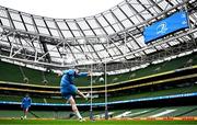 5 April 2024; Harry Byrne kicks during a Leinster rugby captain's run at the Aviva Stadium in Dublin. Photo by Harry Murphy/Sportsfile