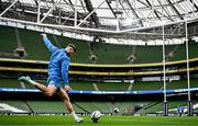 5 April 2024; Ross Byrne kicks during a Leinster rugby captain's run at the Aviva Stadium in Dublin. Photo by Harry Murphy/Sportsfile