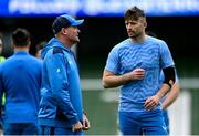 5 April 2024; Senior coach Jacques Nienaber speaks with Ross Byrne during a Leinster rugby captain's run at the Aviva Stadium in Dublin. Photo by Harry Murphy/Sportsfile