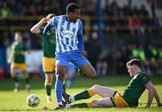 5 April 2024; Success Edogun of Finn Harps is tackled by Harry Curtis of UCD during the SSE Airtricity Men's First Division match between Finn Harps and UCD at Finn Park in Ballybofey, Donegal. Photo by Ramsey Cardy/Sportsfile
