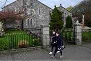 5 April 2024; St Patrick's Athletic players Jamie Lennon, left, and Anto Breslin walk past St Michael's Church, Inchicore, on their way to the SSE Airtricity Men's Premier Division match between St Patrick's Athletic and Shamrock Rovers at Richmond Park in Dublin. Photo by Seb Daly/Sportsfile