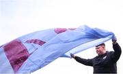 5 April 2024; Drogheda United supporter Aaron Dorgan sets up a flag before the SSE Airtricity Men's Premier Division match between Drogheda United and Shelbourne at Weavers Park in Drogheda, Louth. Photo by Shauna Clinton/Sportsfile