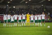 5 April 2024; Cork City players stand for a moments silence in memory of the late Kelly Healy, wife of former Cork City player and manager, Colin, and mother of player, Arran, before the SSE Airtricity Men's First Division match between Cork City and Cobh Ramblers at Turner's Cross in Cork. Photo by Michael P Ryan/Sportsfile