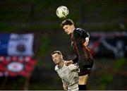 5 April 2024; Paddy Kirk of Bohemians in action against Pádraig Amond of Waterford during the SSE Airtricity Men's Premier Division match between Bohemians and Waterford at Dalymount Park in Dublin. Photo by Piaras Ó Mídheach/Sportsfile