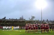 5 April 2024; Cork City players and Cobh Ramblers players stand for a moments silence in memory of the late Kelly Healy, wife of former Cork City player and manager, Colin, and mother of player Arran, before the SSE Airtricity Men's First Division match between Cork City and Cobh Ramblers at Turner's Cross in Cork. Photo by Michael P Ryan/Sportsfile