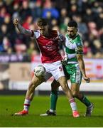 5 April 2024; Mason Melia of St Patrick's Athletic in action against Roberto Lopes of Shamrock Rovers during the SSE Airtricity Men's Premier Division match between St Patrick's Athletic and Shamrock Rovers at Richmond Park in Dublin. Photo by Seb Daly/Sportsfile