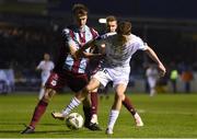 5 April 2024; Will Jarvis of Shelbourne is tackled by Andrew Quinn of Drogheda United during the SSE Airtricity Men's Premier Division match between Drogheda United and Shelbourne at Weavers Park in Drogheda, Louth. Photo by Shauna Clinton/Sportsfile