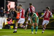 5 April 2024; Aaron Bolger of St Patrick's Athletic, left, celebrates his side's second goal, scored by teammate Alex Nolan, 18, during the SSE Airtricity Men's Premier Division match between St Patrick's Athletic and Shamrock Rovers at Richmond Park in Dublin. Photo by Seb Daly/Sportsfile