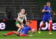 5 April 2024; Denise O'Sullivan of Republic of Ireland is tackled by Maëlle Lakrar of France during the UEFA Women's European Championship qualifying group A match between France and Republic of Ireland at Stade Saint-Symphorien in Metz, France. Photo by Stephen McCarthy/Sportsfile