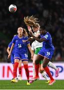 5 April 2024; Amber Barrett of Republic of Ireland in action against Griedge Mbock Bathy, right, and Sandie Toletti of France during the UEFA Women's European Championship qualifying group A match between France and Republic of Ireland at Stade Saint-Symphorien in Metz, France. Photo by Stephen McCarthy/Sportsfile