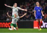 5 April 2024; Denise O'Sullivan, 10, and Megan Connolly of Republic of Ireland protest to referee Maria Caputi, not pictured, during the UEFA Women's European Championship qualifying group A match between France and Republic of Ireland at Stade Saint-Symphorien in Metz, France. Photo by Stephen McCarthy/Sportsfile