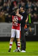 5 April 2024; St Patrick's Athletic manager Jon Daly, right, and Aaron Bolger celebrate after their side's victory in the SSE Airtricity Men's Premier Division match between St Patrick's Athletic and Shamrock Rovers at Richmond Park in Dublin. Photo by Seb Daly/Sportsfile