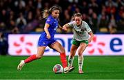 5 April 2024; Delphine Cascarino of France in action against Heather Payne of Republic of Ireland during the UEFA Women's European Championship qualifying group A match between France and Republic of Ireland at Stade Saint-Symphorien in Metz, France. Photo by Baptiste Fernandez/Sportsfile