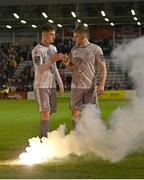 5 April 2024; Waterford players Ben McCormack, left, and Darragh Power after their victory in the SSE Airtricity Men's Premier Division match between Bohemians and Waterford at Dalymount Park in Dublin. Photo by Piaras Ó Mídheach/Sportsfile