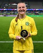 5 April 2024; Republic of Ireland goalkeeper Courtney Brosnan poses for a photograph with the player of the match award after  the UEFA Women's European Championship qualifying group A match between France and Republic of Ireland at Stade Saint-Symphorien in Metz, France. Photo by Stephen McCarthy/Sportsfile