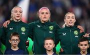 5 April 2024; Republic of Ireland players, from left, Louise Quinn, Caitlin Hayes and Megan Connolly stand for the playing of the National Anthem before the UEFA Women's European Championship qualifying group A match between France and Republic of Ireland at Stade Saint-Symphorien in Metz, France. Photo by Stephen McCarthy/Sportsfile