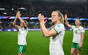 5 April 2024; Republic of Ireland players, from left, Katie McCabe, Diane Caldwell and Kyra Carusa acknowledge supporters after the UEFA Women's European Championship qualifying group A match between France and Republic of Ireland at Stade Saint-Symphorien in Metz, France.  Photo by Stephen McCarthy/Sportsfile