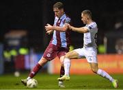 5 April 2024; Oisin Gallagher of Drogheda United is tackled by Liam Burt of Shelbourne during the SSE Airtricity Men's Premier Division match between Drogheda United and Shelbourne at Weavers Park in Drogheda, Louth. Photo by Shauna Clinton/Sportsfile