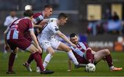5 April 2024; John Martin of Shelbourne is tackled by Jack Keaney, left, and Ryan Brennan, right, of Drogheda United during the SSE Airtricity Men's Premier Division match between Drogheda United and Shelbourne at Weavers Park in Drogheda, Louth. Photo by Shauna Clinton/Sportsfile