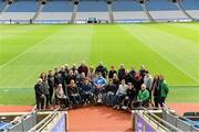 6 April 2024; Members of the GAA Wheelchair Development Group pose for a group photo during the GAA Wheelchair Sports Development Day at Croke Park in Dublin. Photo by Matt Browne/Sportsfile