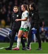 5 April 2024; Heather Payne of Republic of Ireland leaves the pitch with team doctor Siobhan Forman, left, and physiotherapist Angela Kenneally during the UEFA Women's European Championship qualifying group A match between France and Republic of Ireland at Stade Saint-Symphorien in Metz, France. Photo by Stephen McCarthy/Sportsfile