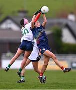 6 April 2024; Roisin Bailey of Carlow in action against Karen O'Leary of Limerick during the Lidl LGFA National League Division 4 final match between Carlow and Limerick at St Brendan’s Park in Birr, Offaly. Photo by Ben McShane/Sportsfile