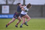 6 April 2024; Grace Lee of Limerick is tackled by Ruth Bermingham of Carlow during the Lidl LGFA National League Division 4 final match between Carlow and Limerick at St Brendan’s Park in Birr, Offaly. Photo by Ben McShane/Sportsfile