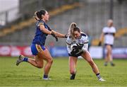6 April 2024; Fidelma Marrinan of Clare in action against Saoirse Wynne of Roscommon during the Lidl LGFA National League Division 3 final match between Clare and Roscommon at St Brendan’s Park in Birr, Offaly. Photo by Ben McShane/Sportsfile
