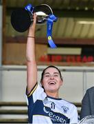 6 April 2024; Clare captain Caoimhe Harvey lifts the cup after the Lidl LGFA National League Division 3 final match between Clare and Roscommon at St Brendan’s Park in Birr, Offaly. Photo by Ben McShane/Sportsfile