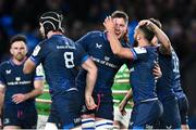 6 April 2024; Jamison Gibson-Park of Leinster celebrates with teammates after scoring their side's first try during the Investec Champions Cup Round of 16 match between Leinster and Leicester Tigers at the Aviva Stadium in Dublin. Photo by Ramsey Cardy/Sportsfile