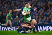 6 April 2024; Jasper Wiese of Leicester Tigers is tackled by Ross Byrne, bottom, and Robbie Henshaw of Leinster during the Investec Champions Cup Round of 16 match between Leinster and Leicester Tigers at the Aviva Stadium in Dublin. Photo by Tyler Miller/Sportsfile