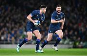 6 April 2024; Ross Byrne, left, and Robbie Henshaw of Leinster during the Investec Champions Cup Round of 16 match between Leinster and Leicester Tigers at the Aviva Stadium in Dublin. Photo by Ramsey Cardy/Sportsfile