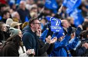 6 April 2024; Leinster supporters celebrate their side's second try, scored by Jamison Gibson-Park, during the Investec Champions Cup Round of 16 match between Leinster and Leicester Tigers at the Aviva Stadium in Dublin. Photo by Ramsey Cardy/Sportsfile