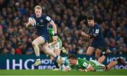 6 April 2024; Jamie Osborne of Leinster evades the tackle of Jasper Wiese of Leicester Tigers during the Investec Champions Cup Round of 16 match between Leinster and Leicester Tigers at the Aviva Stadium in Dublin. Photo by Seb Daly/Sportsfile
