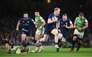 6 April 2024; Jamie Osborne of Leinster evades the tackle of Jasper Wiese of Leicester Tigers to set-up his side's third try during the Investec Champions Cup Round of 16 match between Leinster and Leicester Tigers at the Aviva Stadium in Dublin. Photo by Ramsey Cardy/Sportsfile