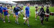 6 April 2024; The Clare captain Conor Cleary leads his players during the parade before the Allianz Hurling League Division 1 final match between Clare and Kilkenny at FBD Semple Stadium in Thurles, Tipperary. Photo by Piaras Ó Mídheach/Sportsfile Photo by Piaras Ó Mídheach/Sportsfile