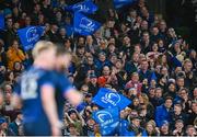 6 April 2024; Leinster supporters celebrate their side's fourth try, scored by Robbie Henshaw, during the Investec Champions Cup Round of 16 match between Leinster and Leicester Tigers at the Aviva Stadium in Dublin. Photo by Ramsey Cardy/Sportsfile