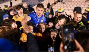 6 April 2024; The Clare captain Conor Cleary is congratulated by supporters after lifting the trophy after the Allianz Hurling League Division 1 final match between Clare and Kilkenny at FBD Semple Stadium in Thurles, Tipperary. Photo by Piaras Ó Mídheach/Sportsfile