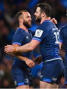 6 April 2024; Robbie Henshaw of Leinster, right, celebrates with team-mate Jamison Gibson-Park after scoring their side's fourth try during the Investec Champions Cup Round of 16 match between Leinster and Leicester Tigers at the Aviva Stadium in Dublin. Photo by Tyler Miller/Sportsfile